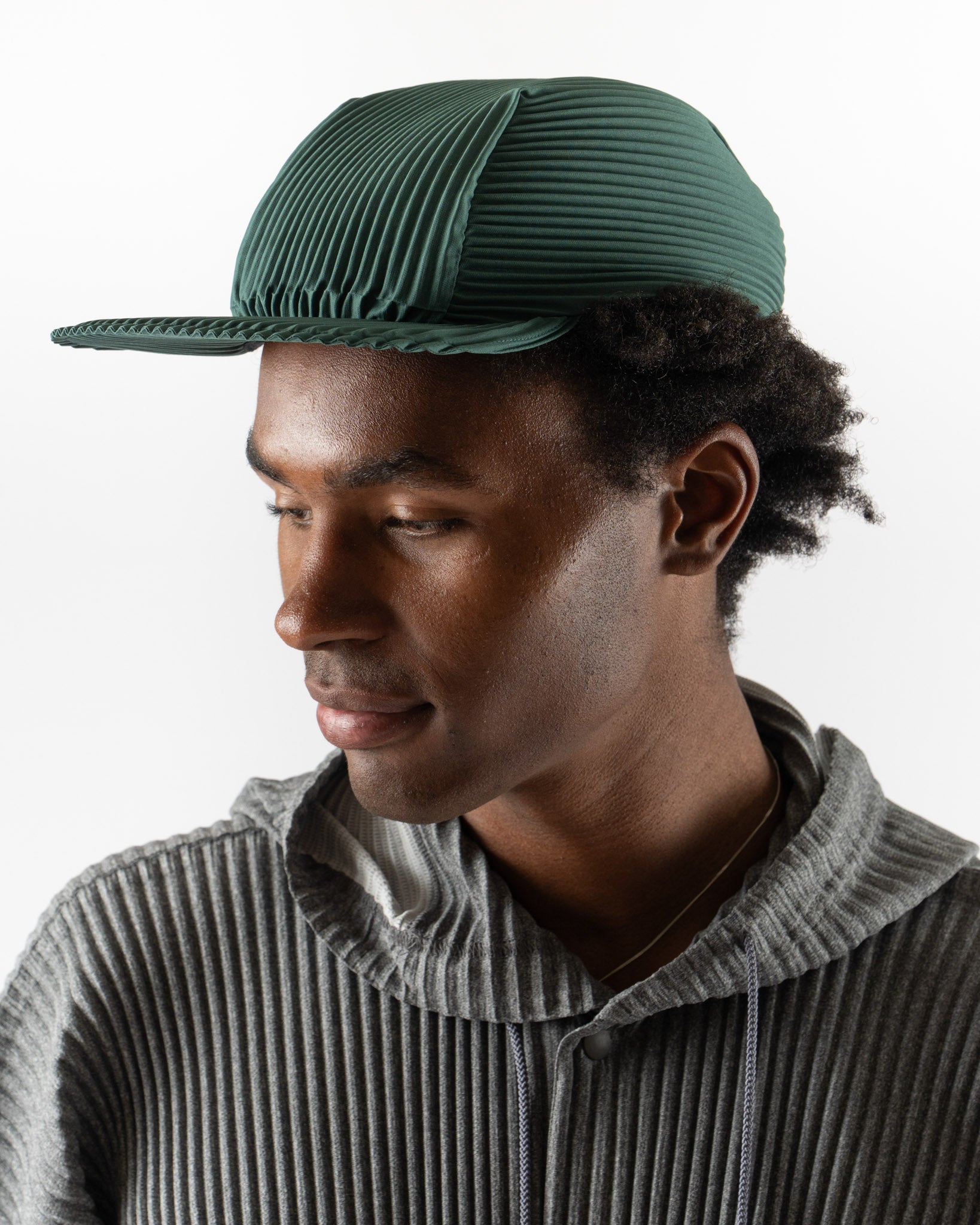 Homme Plissé Issey Miyake Pleats Cap in Evergreen Curated at Jake