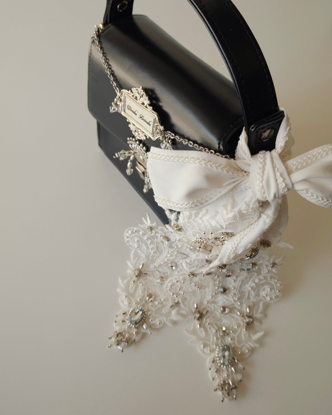 tanakadaisuke(タナカダイスケ)|バッグ|silver tag mini hand bag