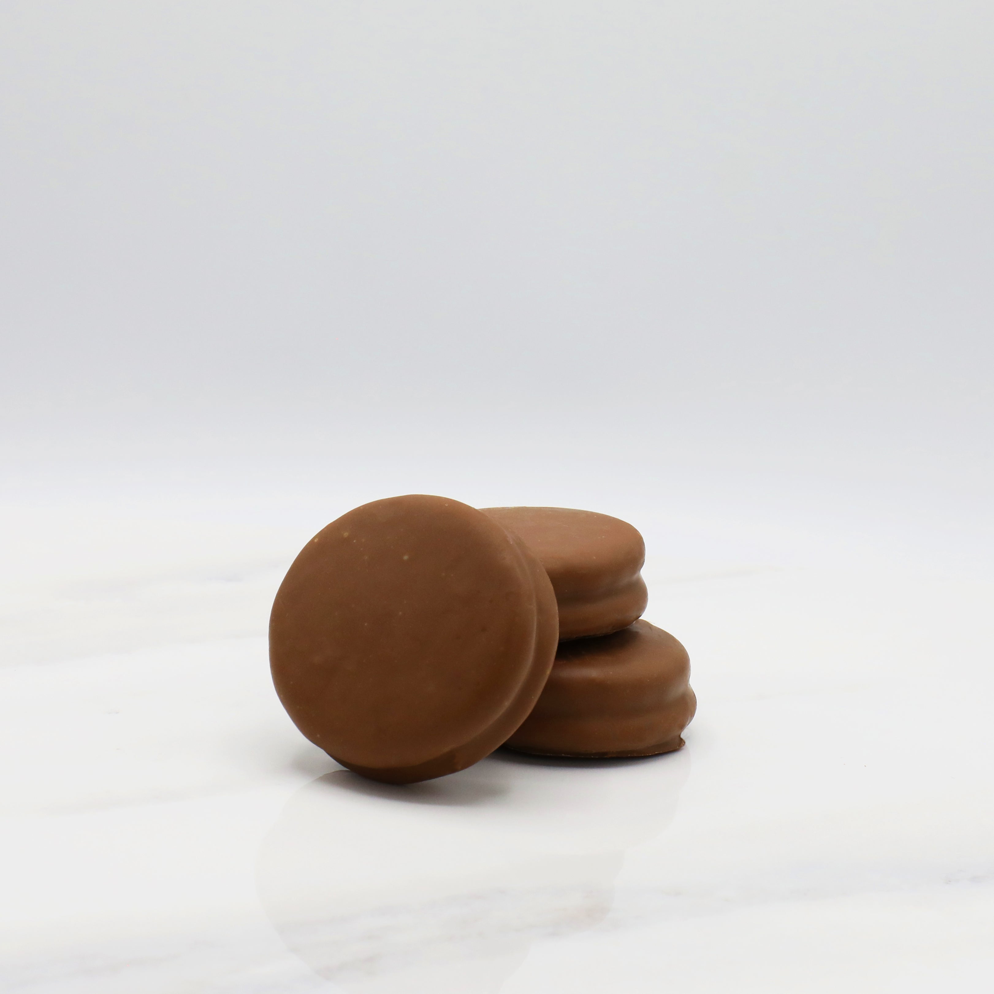 MILK CHOCOLATE COVERED DOUBLE STUFFED OREOS – TEMPER CHOCOLATES