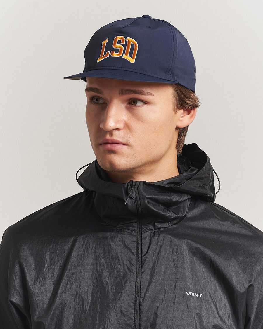 Satisfy FliteSilk Running Cap Navy at CareOfCarl.com