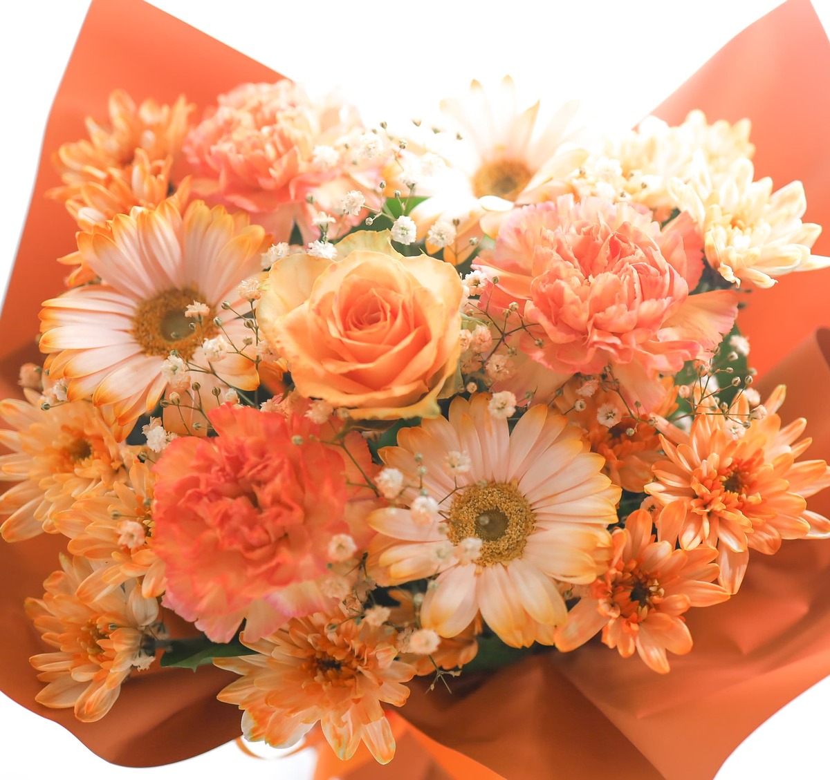 周年祝いの花＞フラワーアレンジメント *キュートオレンジ