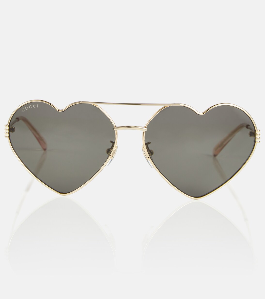 Heart-shaped sunglasses in gold - Gucci | Mytheresa