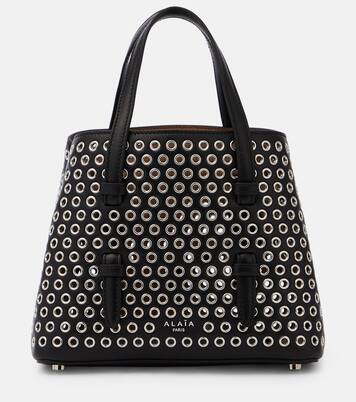Mina 20 embellished leather tote bag in black - Alaia | Mytheresa