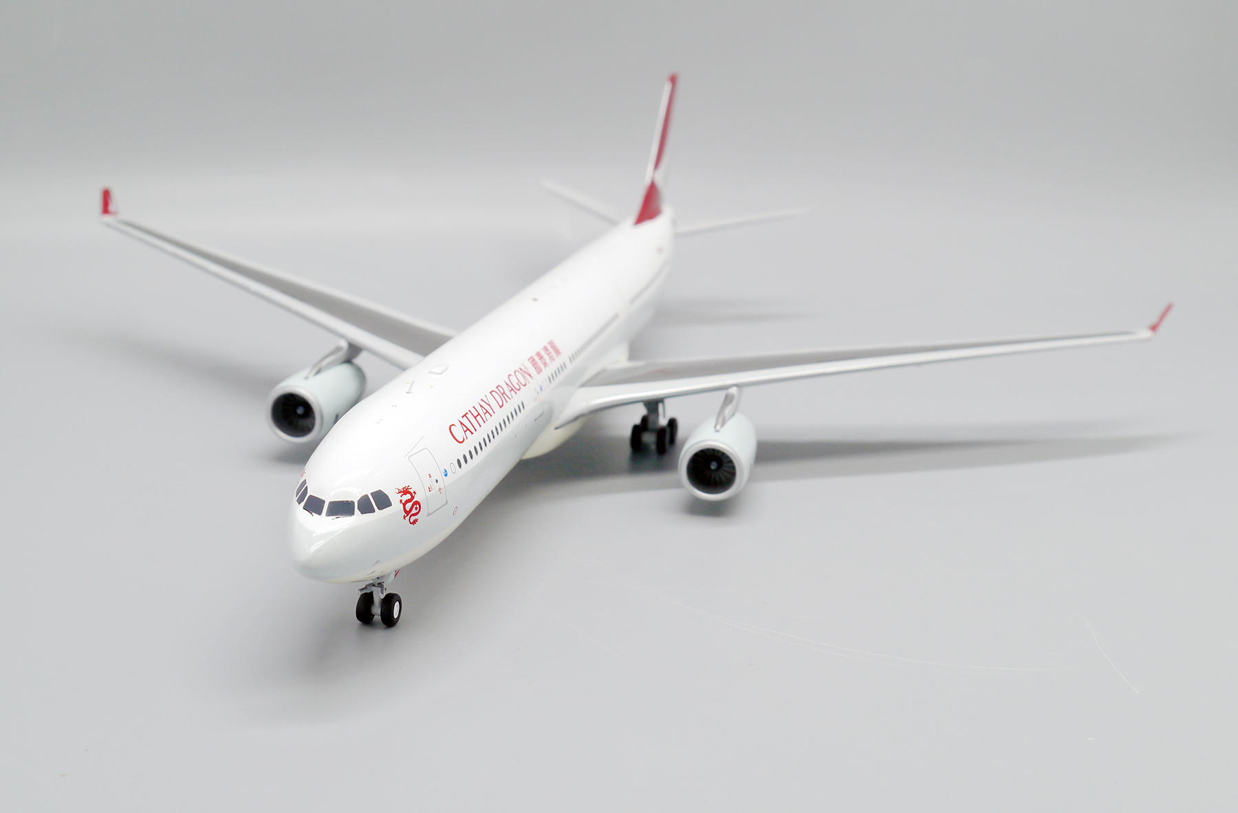 ScaleModelStore.com :: JC Wings 1:200 - EW2333008 - Cathay Dragon