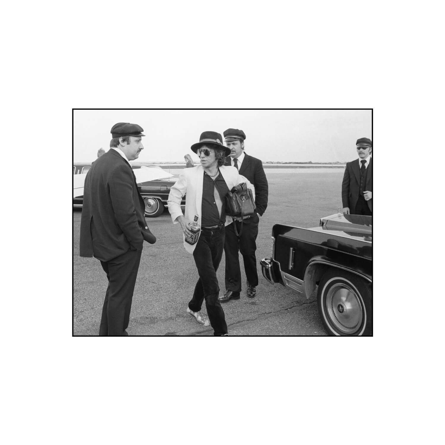 Keith Richards, Holding a Bottle of Jack Daniels, Midwest Airport