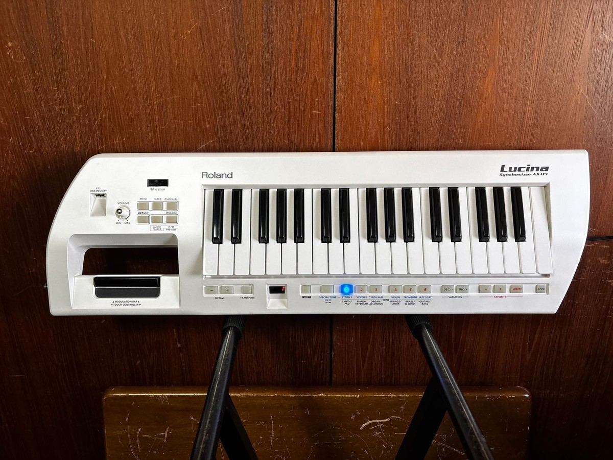 Roland Lucina AX-09 37-Key Keytar Synthesizer Pearl White w/ case