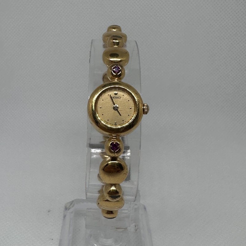 SEIKO 1E20-0420 Gold Ruby Accent Quartz Ladies Watch Vintage Non