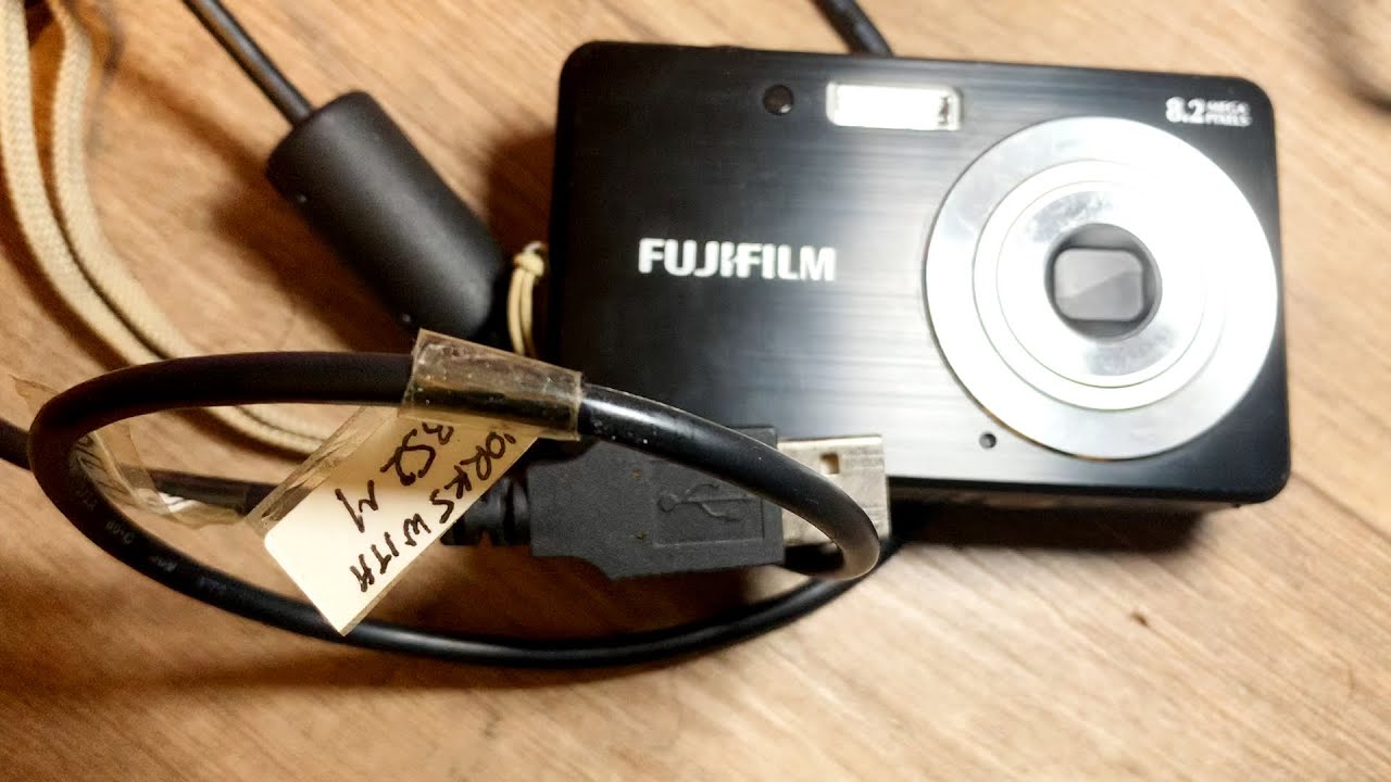 How to charge the battery Fujifilm Finepix J10 Tutorial - YouTube