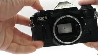 Canon AE-1 Program 35mm SLR Film Camera Black with FD 50mm F/1.4