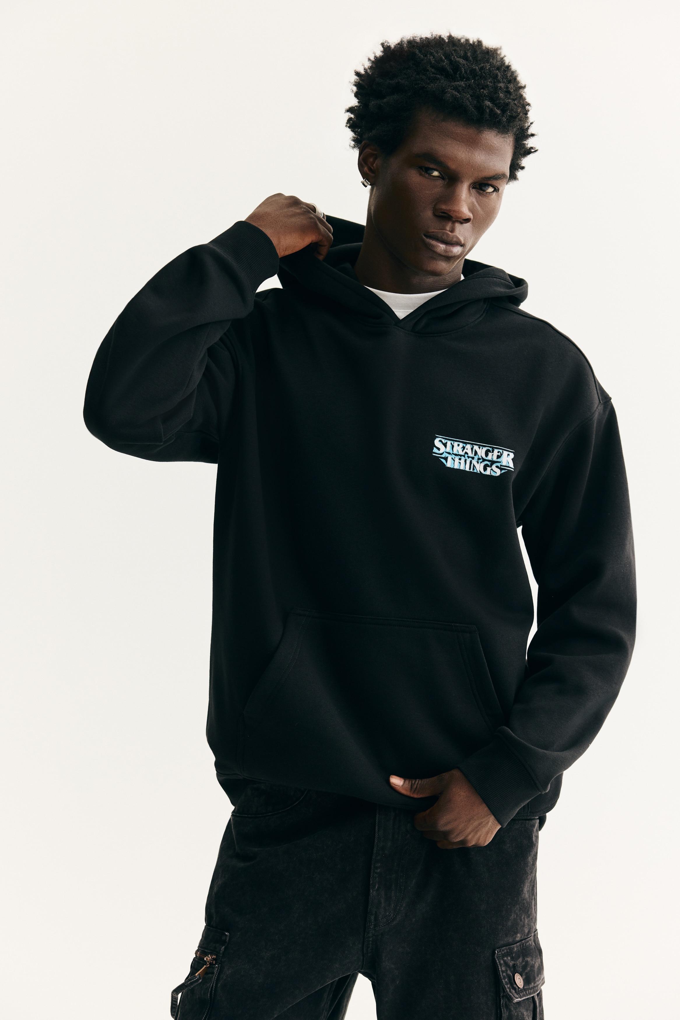 Loose Fit Hoodie - Black/Stranger Things - Men | H&M US
