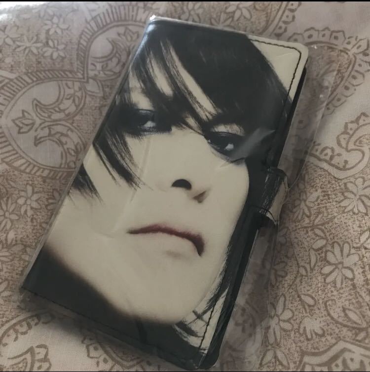 新品】buck-tick 櫻井敦司スマートフォンケースM 未開封の落札情報詳細