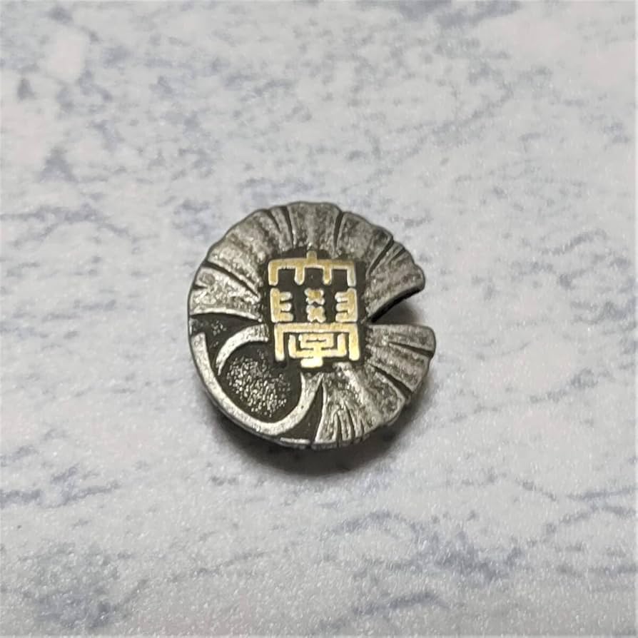 清華大学100周年記念バッジ