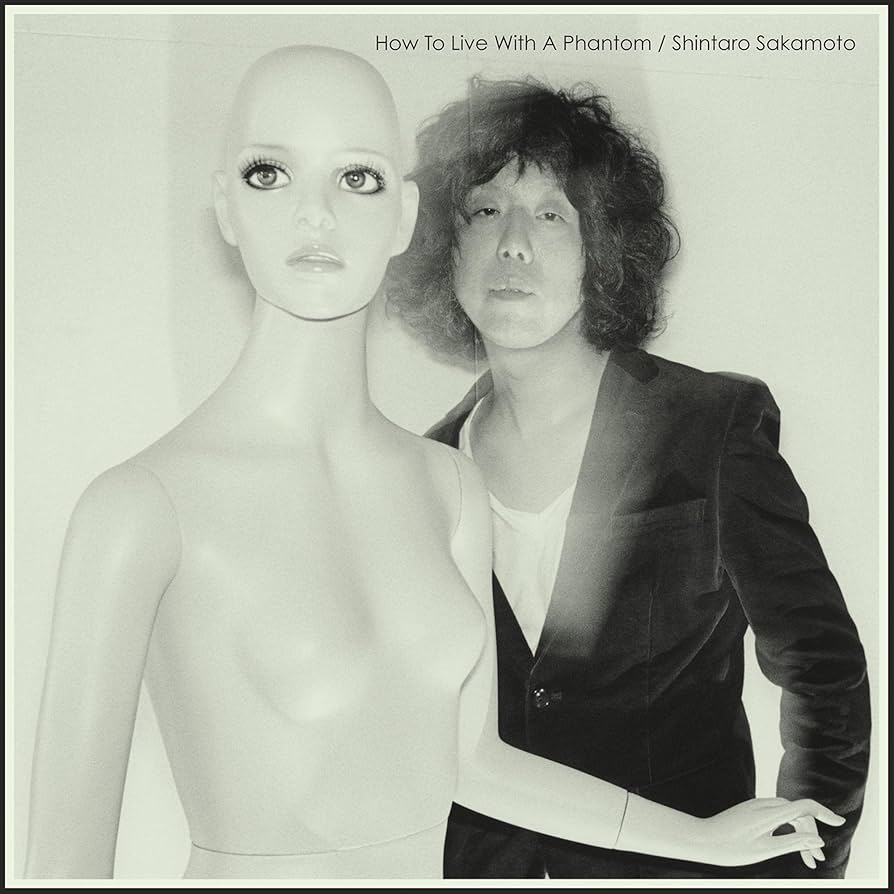 Amazon.co.jp: How to Live With a..: ミュージック