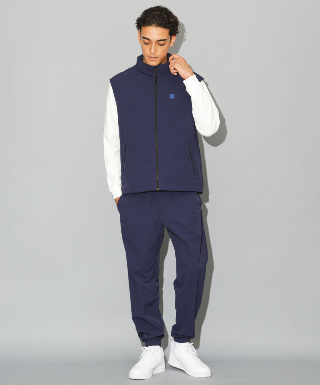 NVyby 5525」NUナイロンスタンドネック中綿ベスト