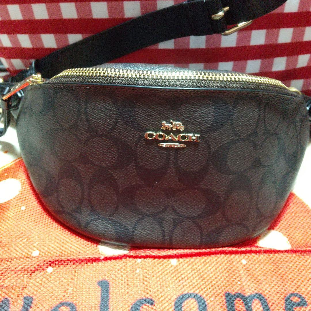 COACH ロゴ入りブラウンレザーボディバッグの通販｜www.reigneleven.com