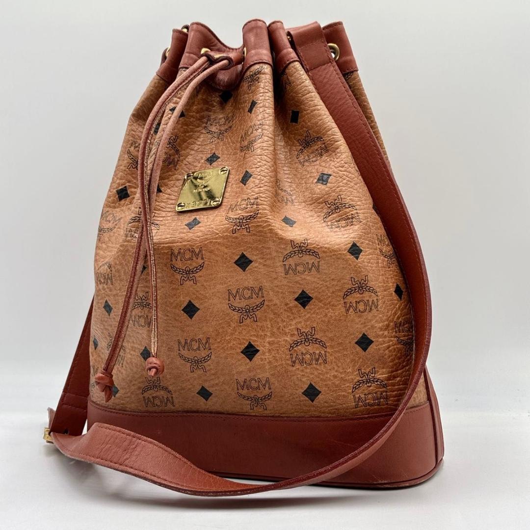 美品 MCM 巾着バッグ ショルダーバッグ ヴィセトス柄 レザー ブラウン