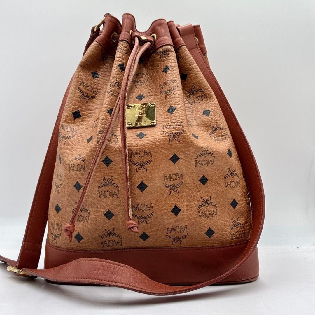美品 MCM 巾着バッグ ショルダーバッグ ヴィセトス柄 レザー ブラウン