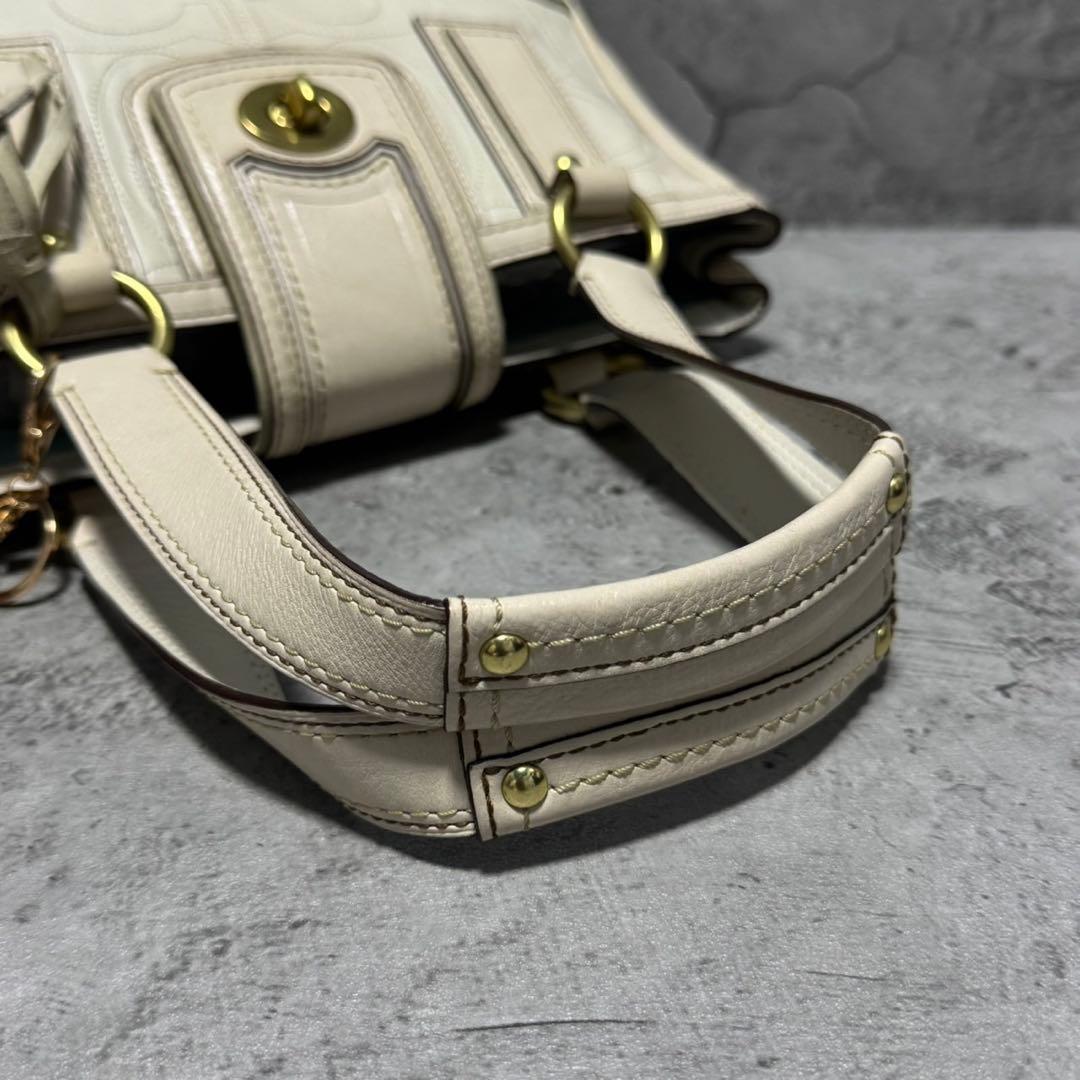 COACH Y2K Signature TurnLock Boston Bag - メルカリ