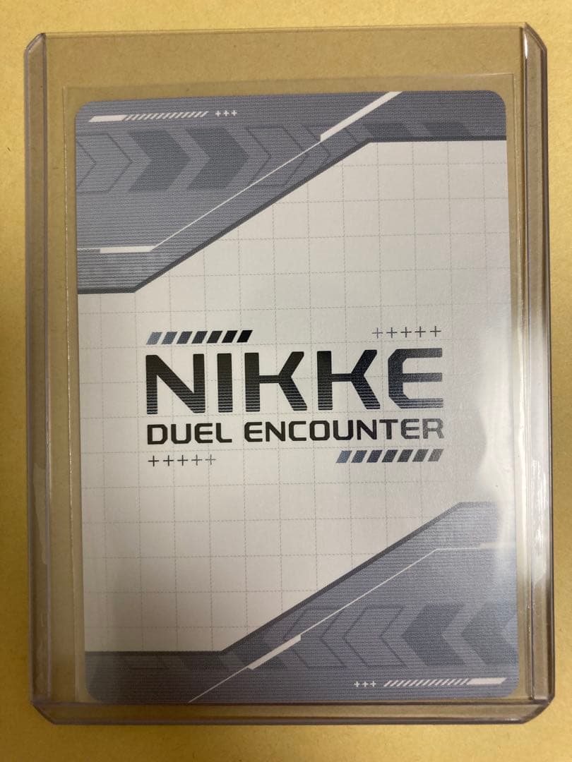 て*く様 NIKKE DUEL ENCOUNTER【サイン箔押し入りカード】ブラ - メルカリ