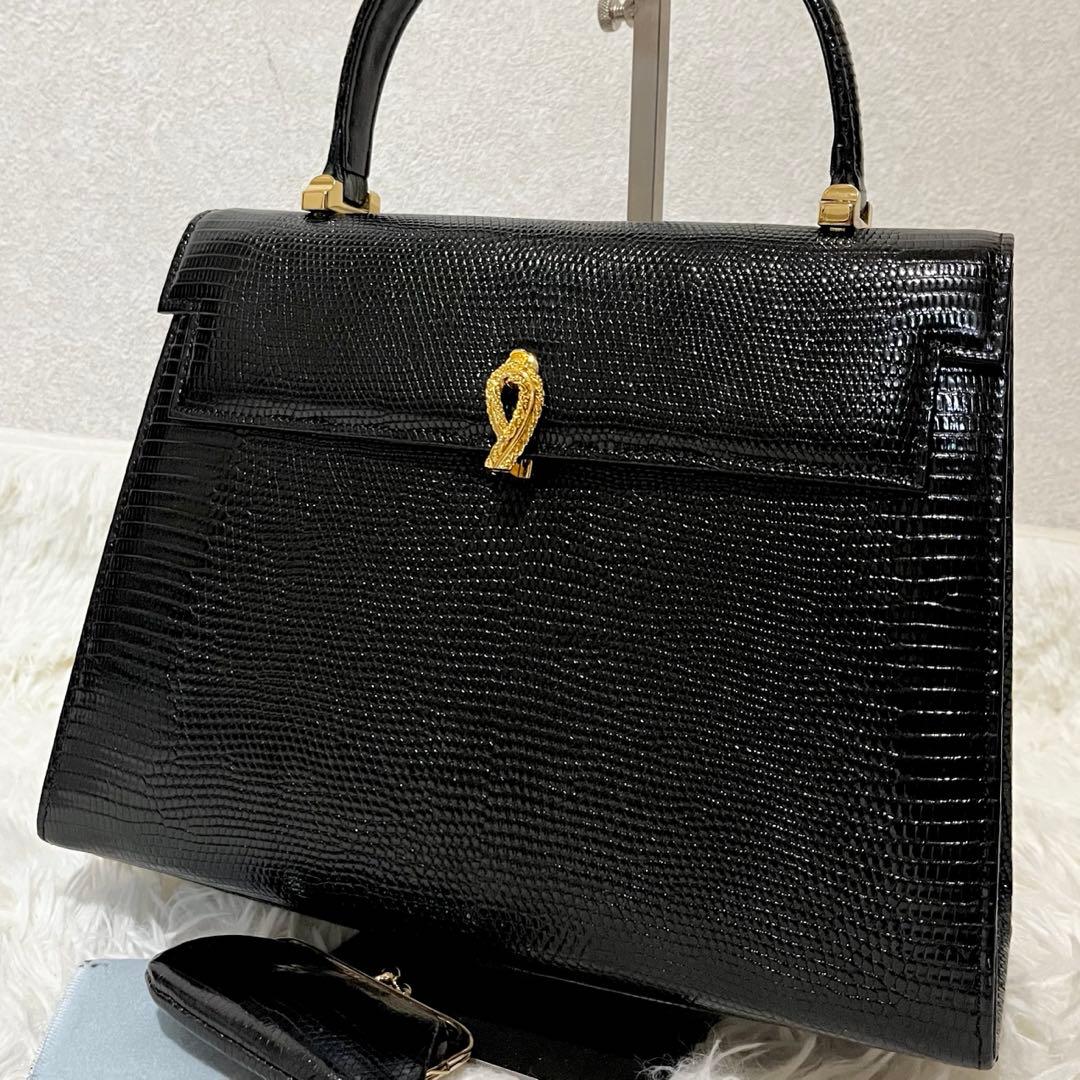 リザード型押し フォーマル ハンドバッグ 黒 ゴールド金具 自立 - メルカリ