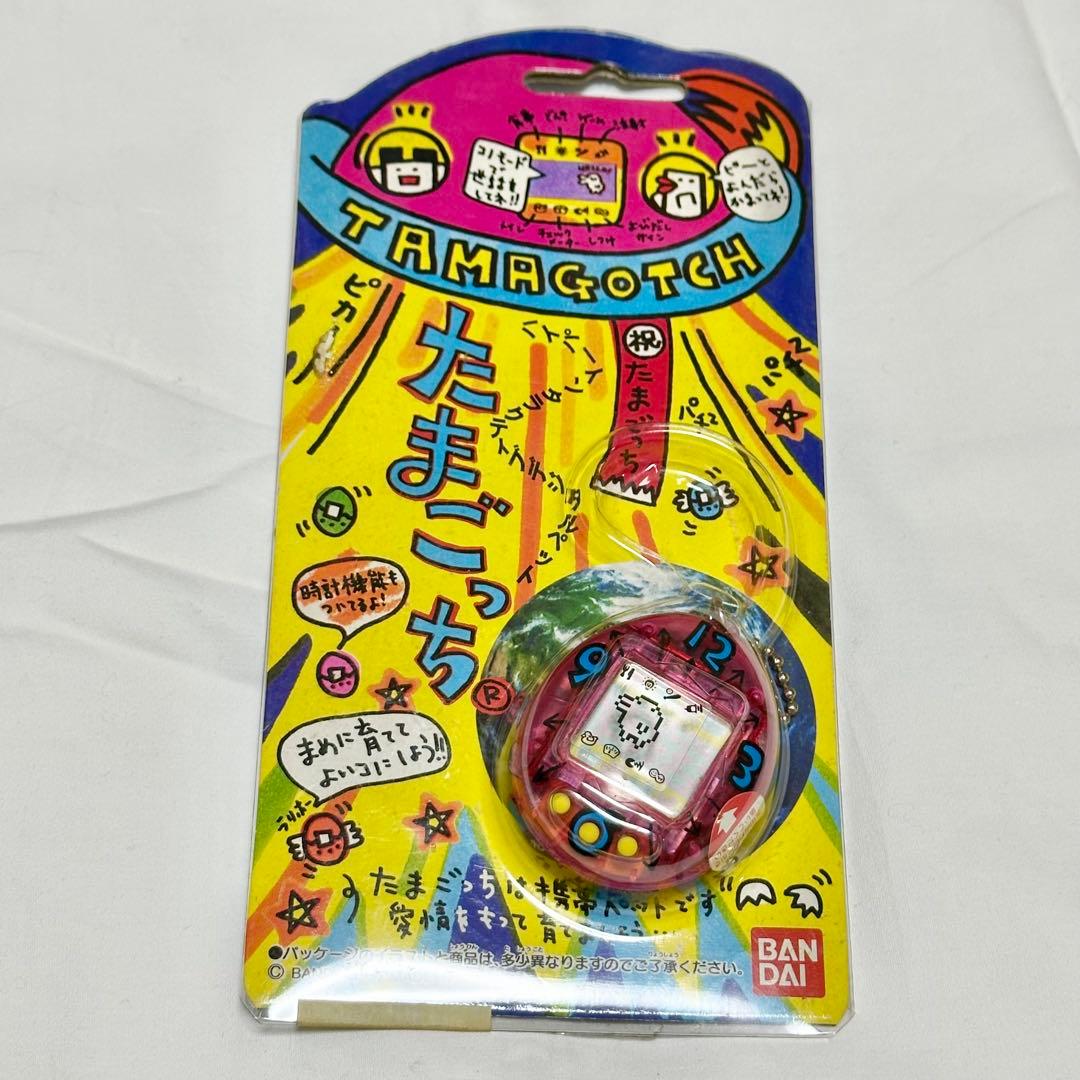 未使用】たまごっち 初代 スケルトンピンク 時計数字ロゴ - メルカリ