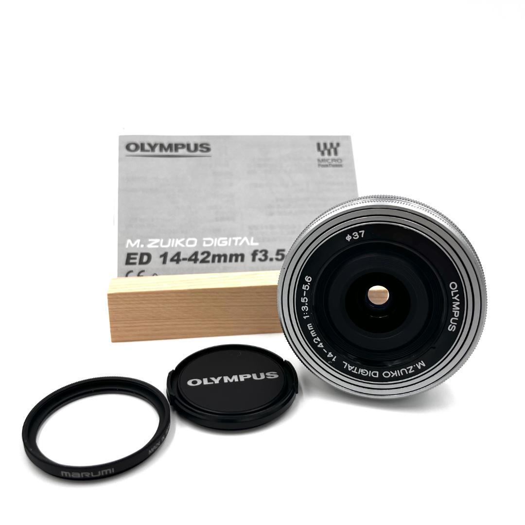 オリンパス 電動パンケーキレンズ M.ZUIKO 14-42mm silver Amazon.co.jp: OLYMPUS 電動式パンケーキズームレンズ M.ZUIKO DIGITAL