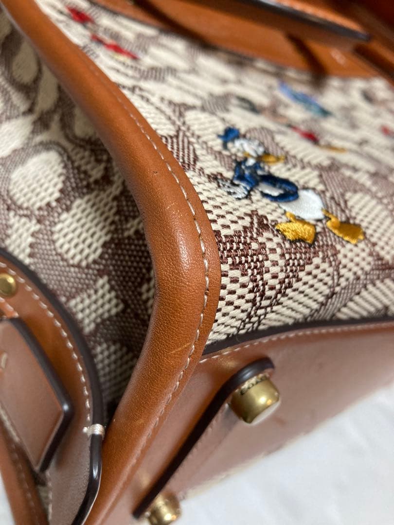 ご予約品【DISNEY×COACH】ディズニー50周年 ショルダーバッグ - メルカリ