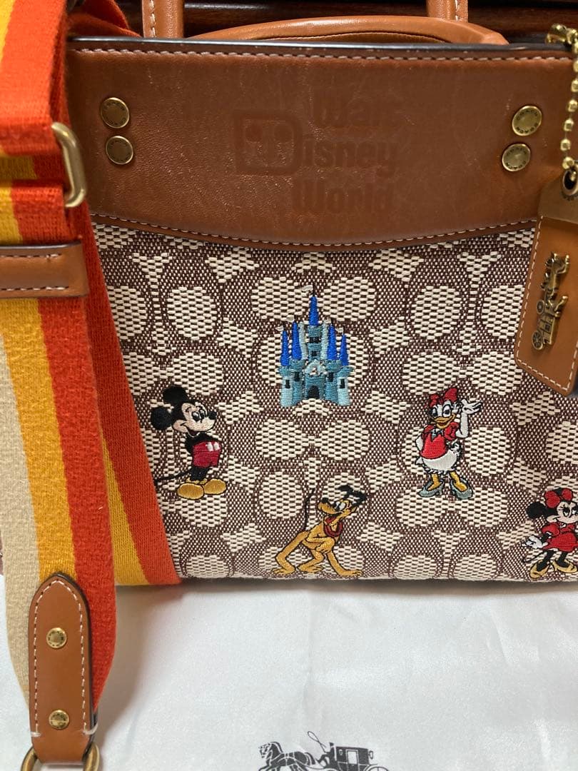 ご予約品【DISNEY×COACH】ディズニー50周年 ショルダーバッグ - メルカリ