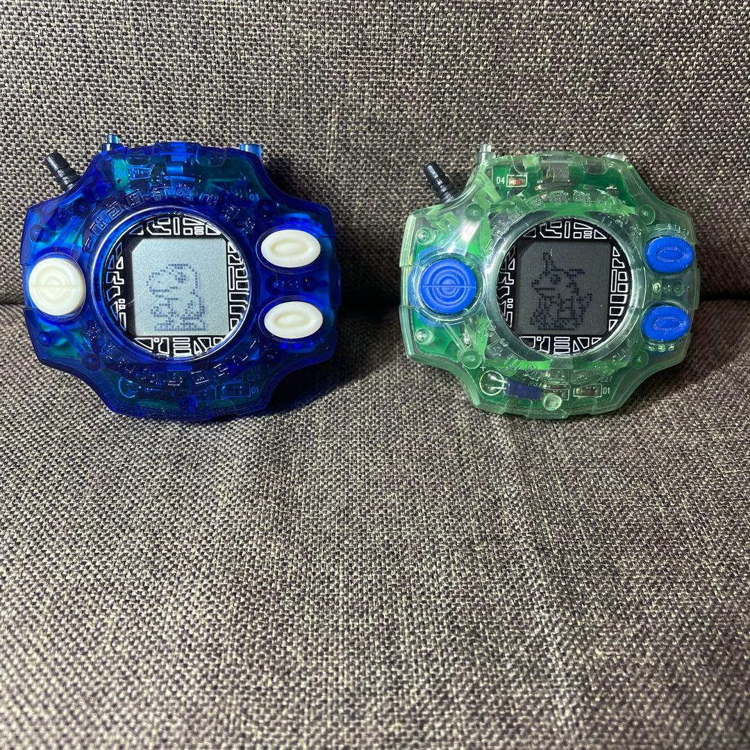 デジモン》初代デジヴァイス クリア×ブルー（電池付き） - メルカリ