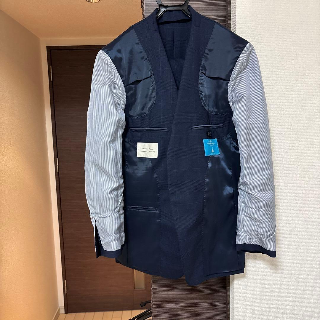 ユニバーサルランゲージ スーツ ネイビー チェック柄 - メルカリ