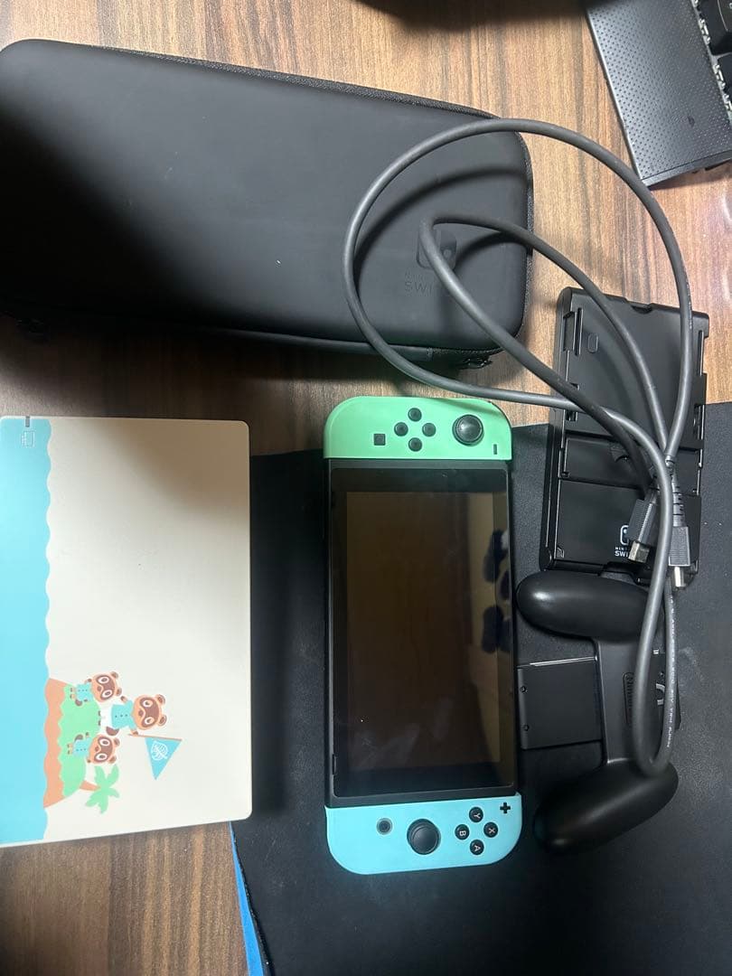 Nintendo Switch 本体　どうぶつの森カラー あつまれ どうぶつの森」特別デザインのSwitch本体セットとキャリング