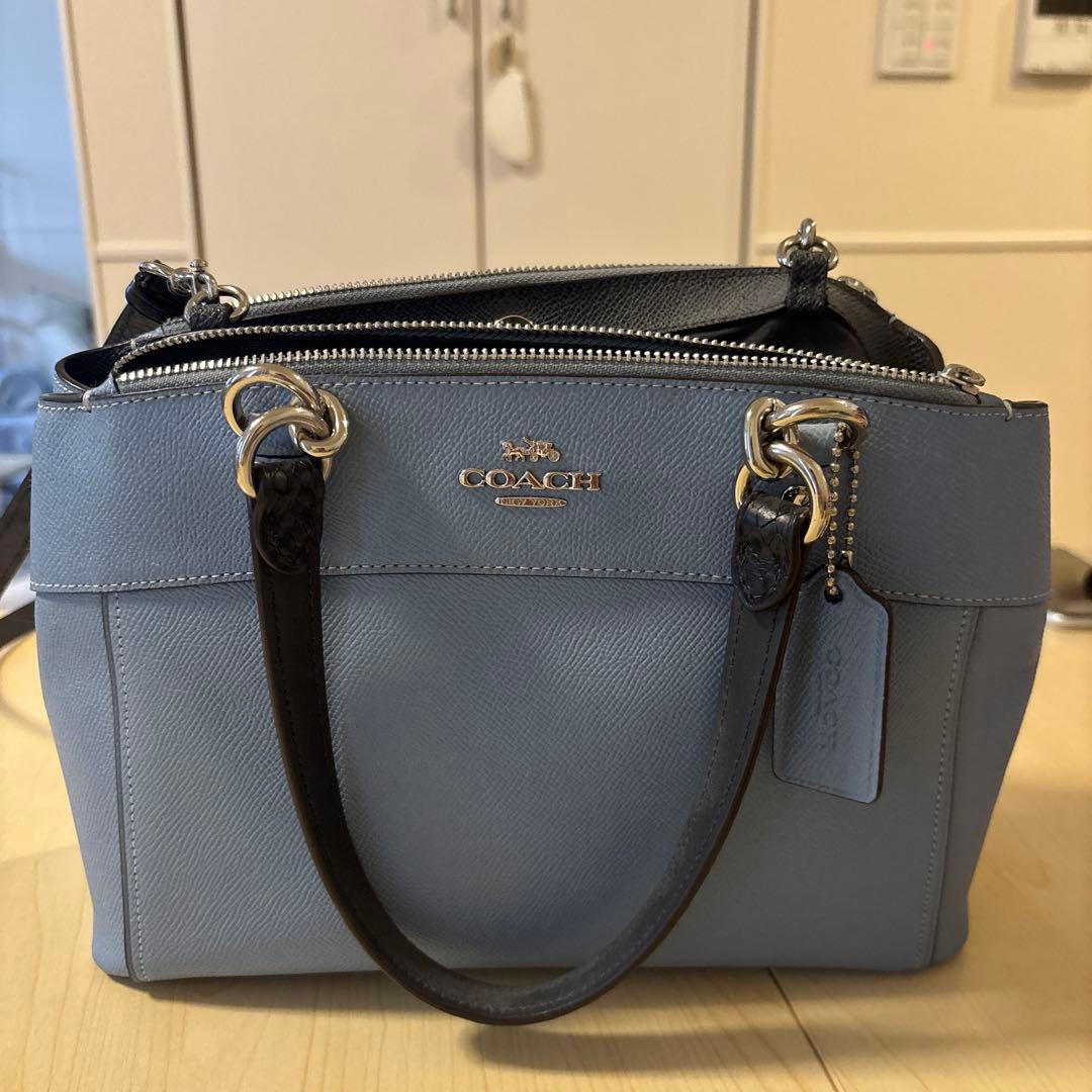 COACH ライトブルー ショルダーバッグ - メルカリ