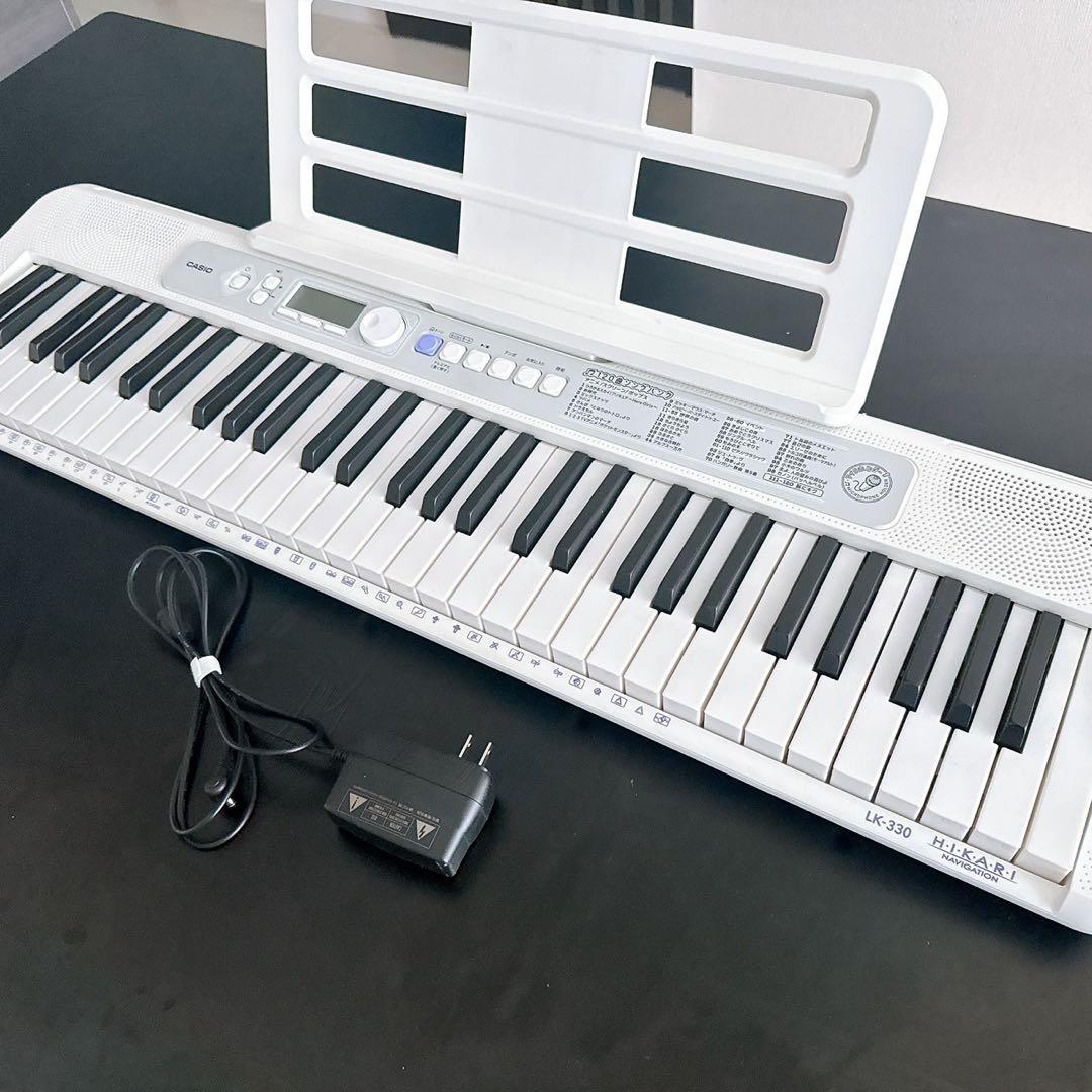 CASIO LK-330 光る鍵盤 61鍵 Amazon.co.jp: CASIO LK-330 光ナビゲーションキーボード 61鍵盤