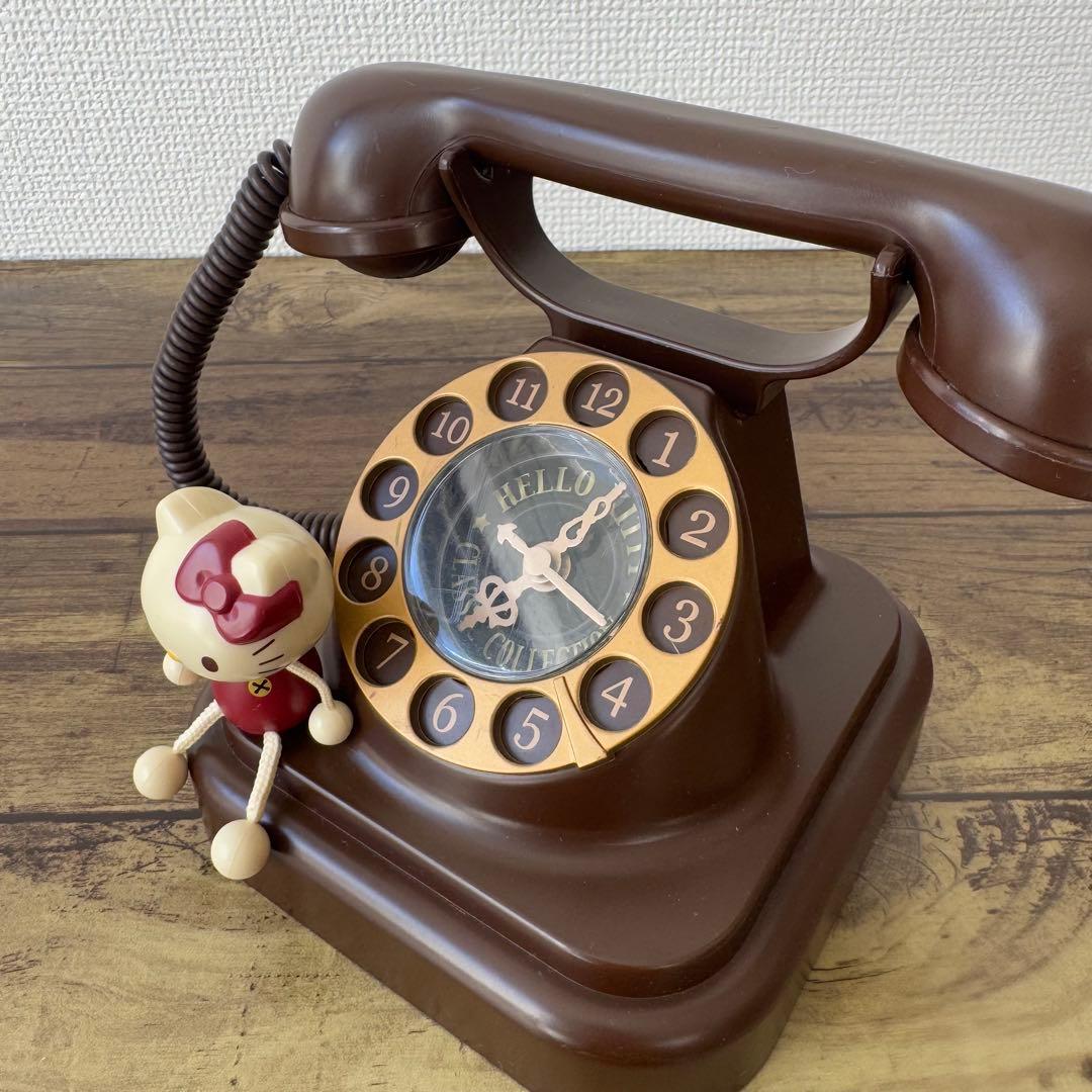 ハローキティ 黒電話 レトロ 電話型クロック 時計 - メルカリ