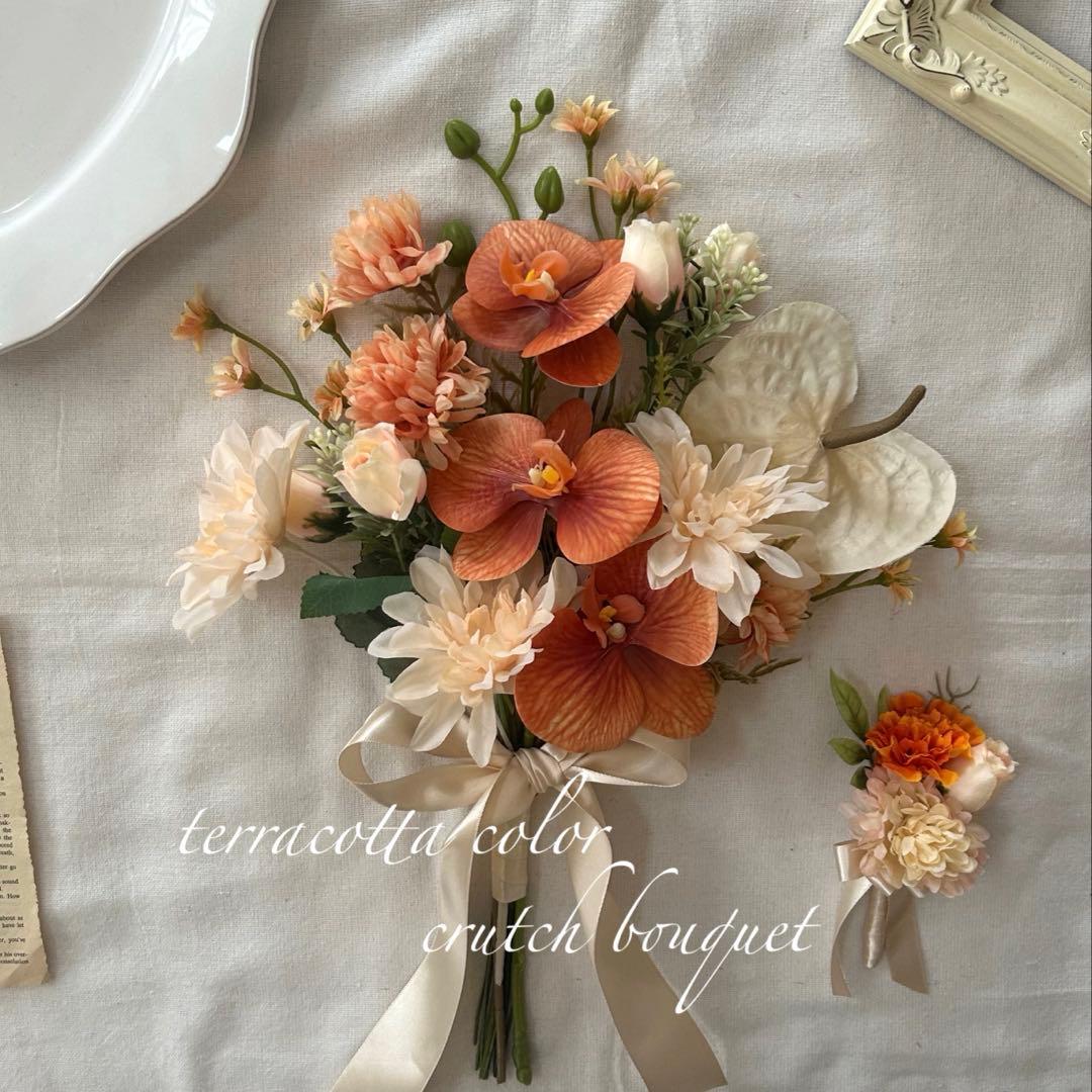 テラコッタカラー胡蝶蘭オレンジクラッチブーケ＆ブートニア 胡蝶蘭と