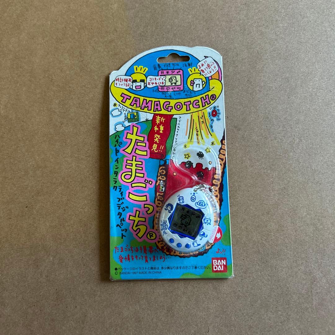 初代 たまごっち ホワイトxブルーロゴ 未使用 おまけ付き（中古