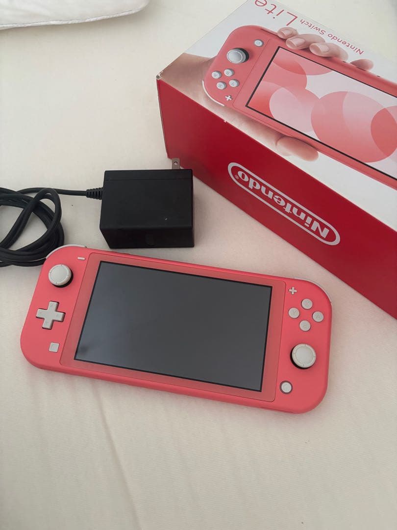 NintendoSwitchLiteスイッチライト本体 コーラルピンク Amazon.co.jp: Nintendo Switch Lite コーラル : ゲーム