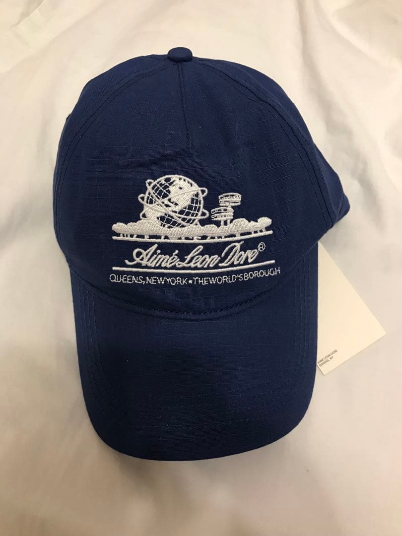 Aimé Leon Dore ネイビーキャップ Aime Leon Dore Nylon Unisphere Snapback Cap / Cream x Navy