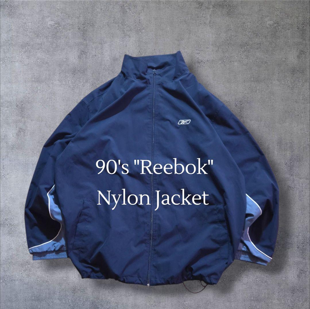90s Reebokリーボックナイロンジャケット 刺繍ロゴ万国旗タグビッグサイズ 90s Reebokリーボックナイロンジャケット 刺繍ロゴ万国旗タグビッグ
