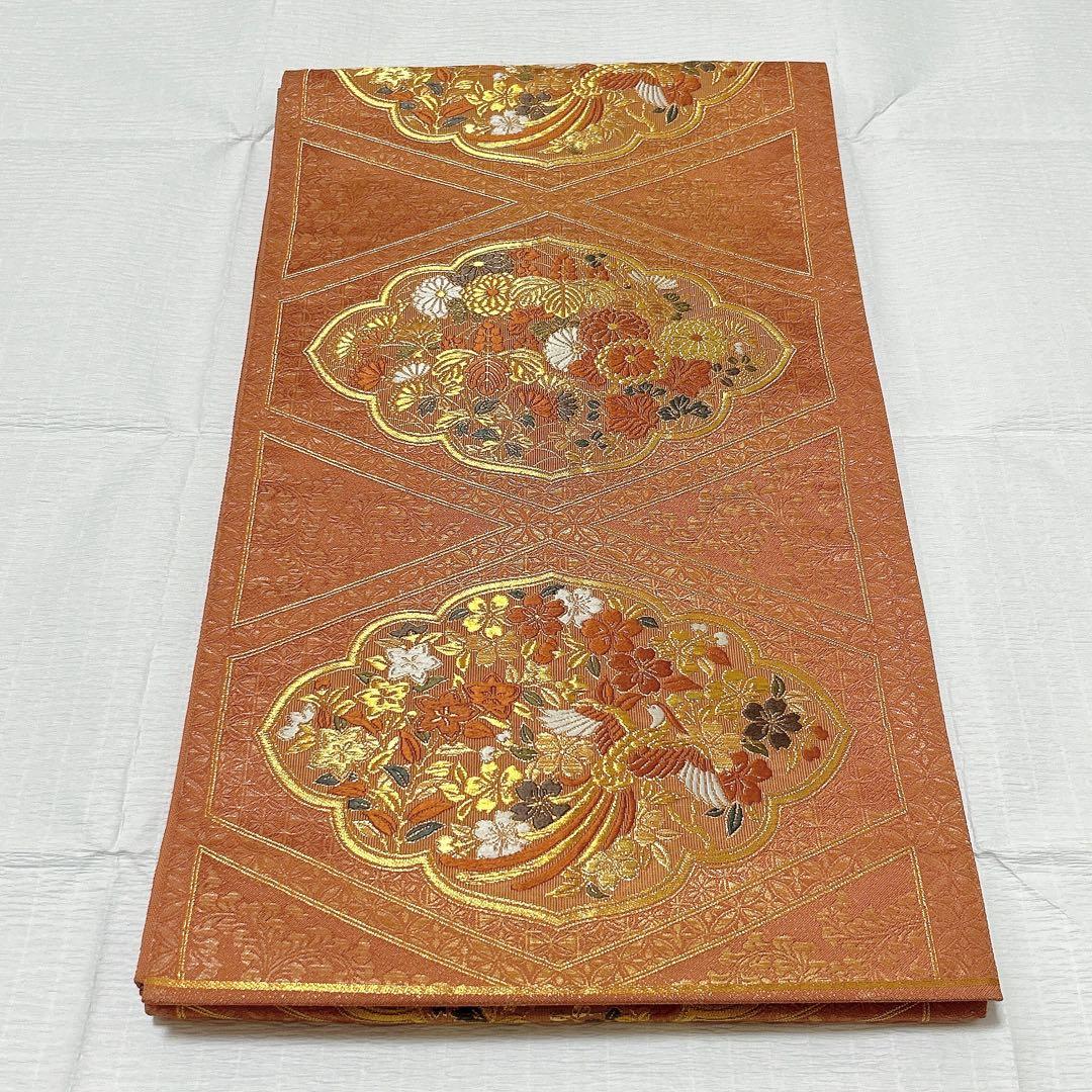 梅垣織物 袋帯 西陣織 七宝菱蒔絵文 正絹 金糸 オレンジゴールド系