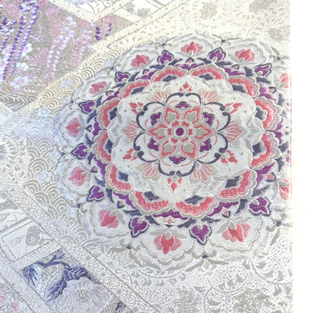 5k2780 袋帯 絹 唐織 プラチナ箔 正倉院文様 華文 銀色 白 ピンク 紫
