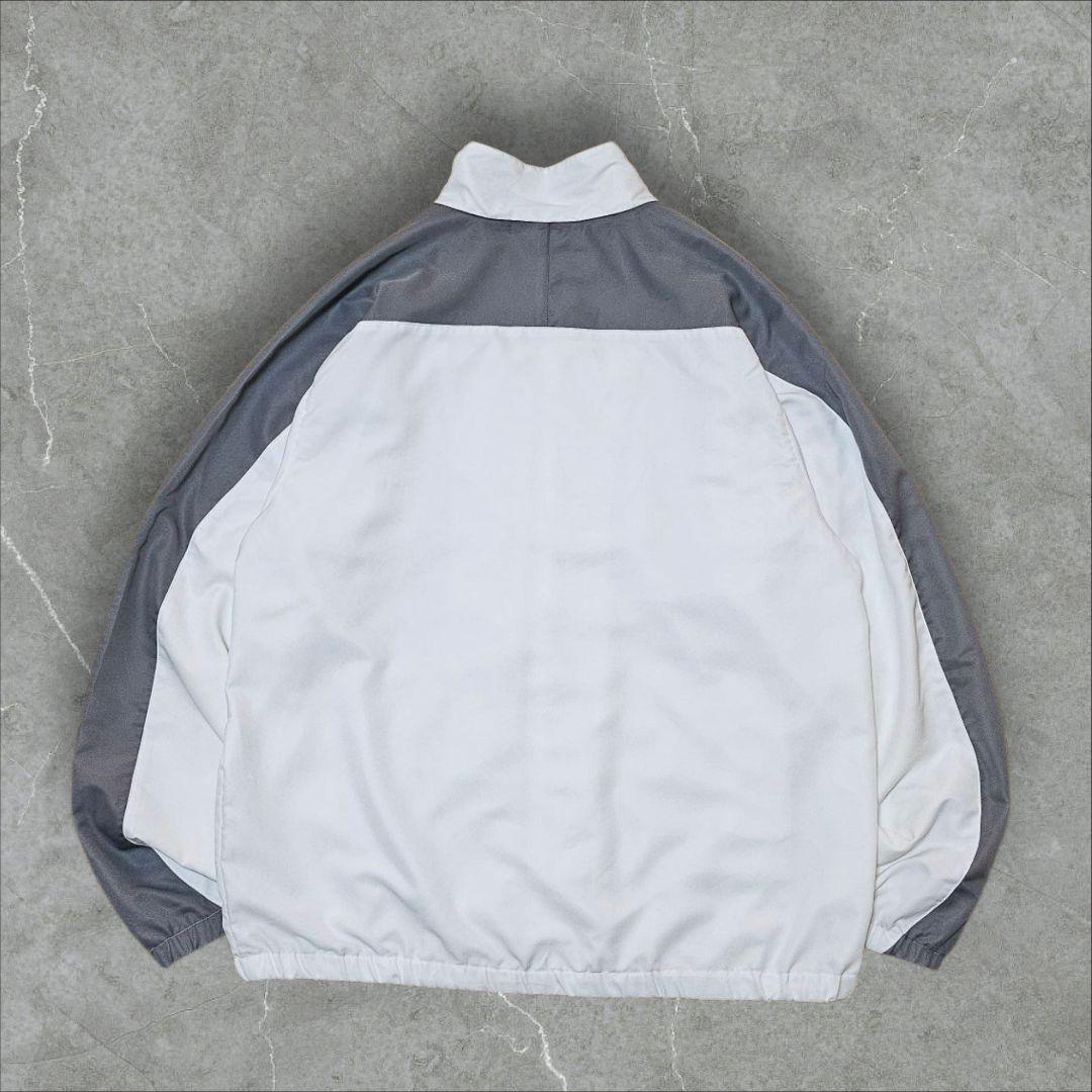 90s Reebok リーボック ナイロンジャケット 刺繍ロゴ 万国旗タグ XL