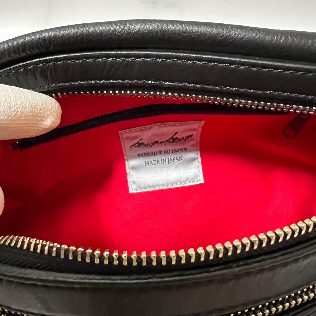 美品☆ カワカワ ハトメ ボディバッグ レザー