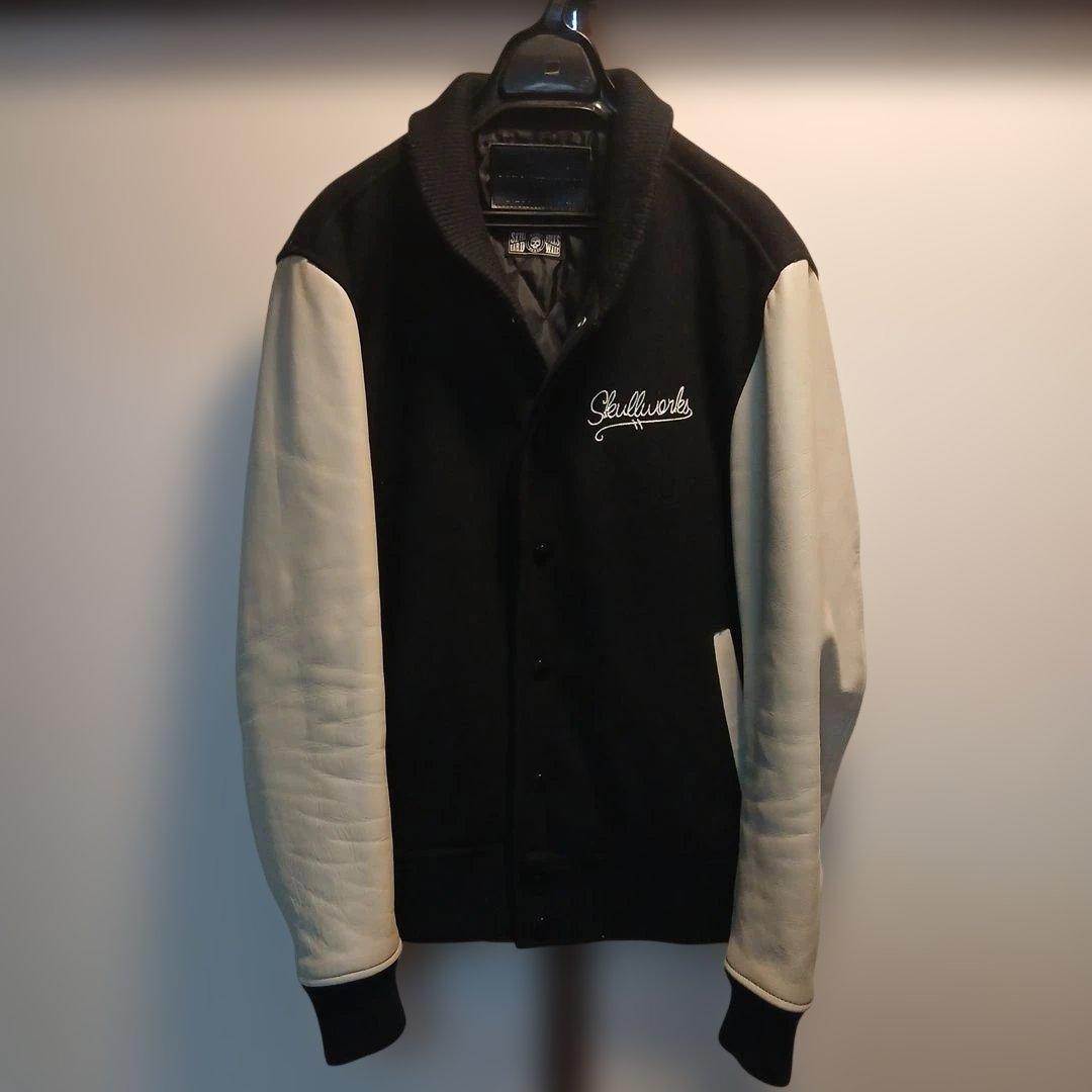 ブランドコラボウール混本革牛袖スタジャン黒ベージュボーンスカル
