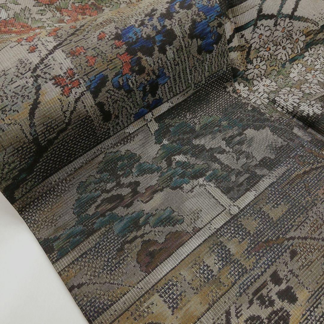 本場大島紬(袷) (四季の草花紋様 恵 積五郎(絣の魔術師) 裄68㌢身幅