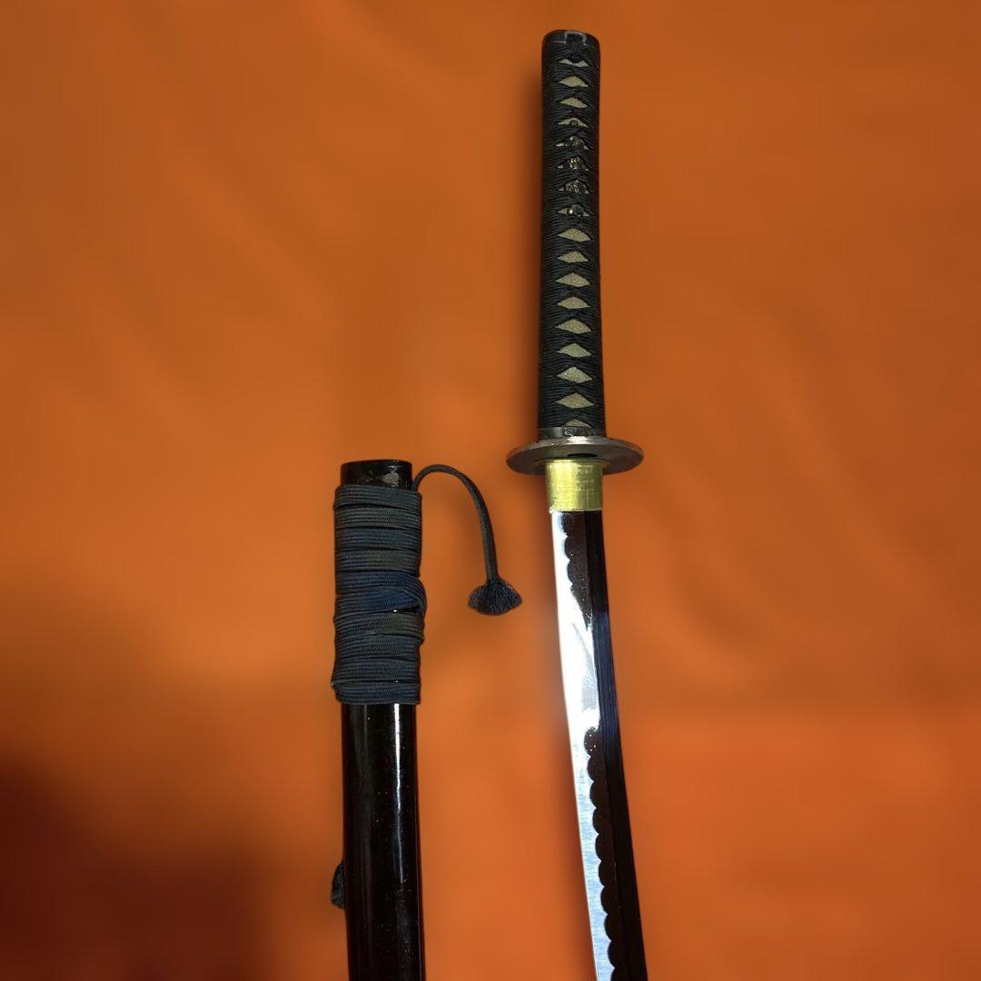 上級模造刀 黒柄 獅子彫丸鍔 濃赤茶呂鞘 - メルカリ