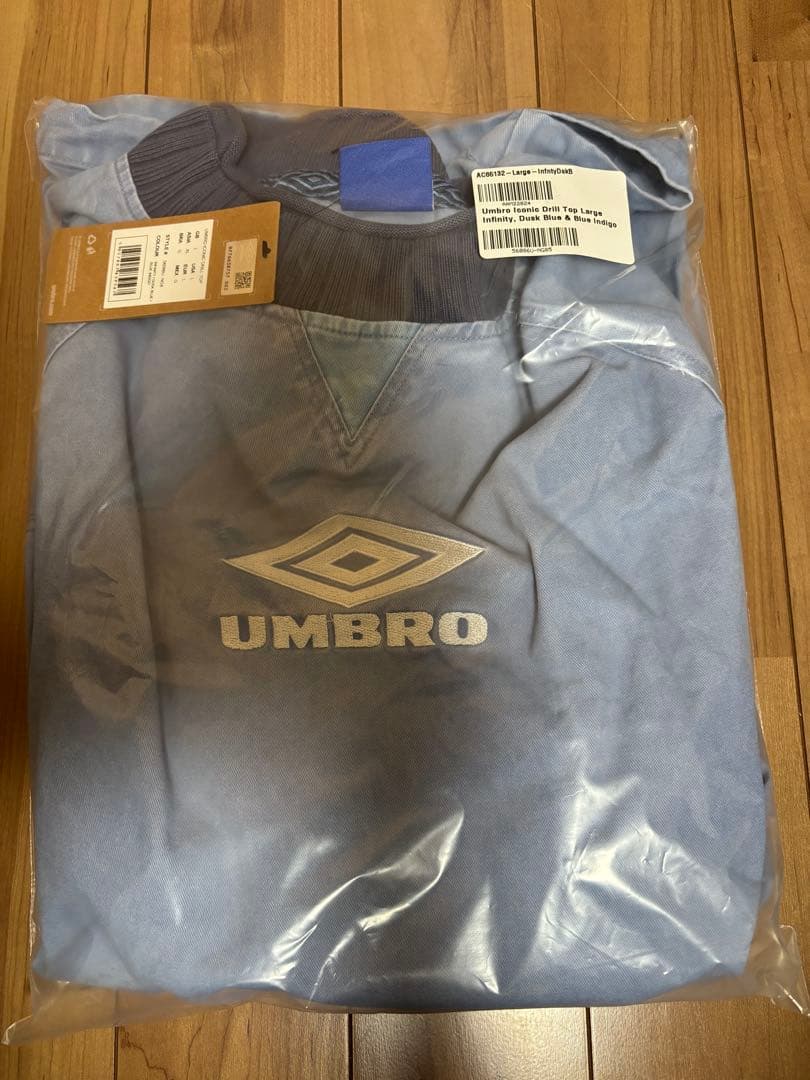 新品未使用】UMBRO ICONIC DRILL TOPリアム oasis - メルカリ