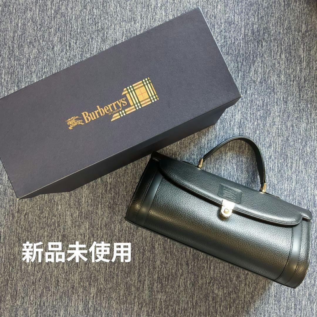 Burberry ブラックレザー ハンドバッグ - メルカリ