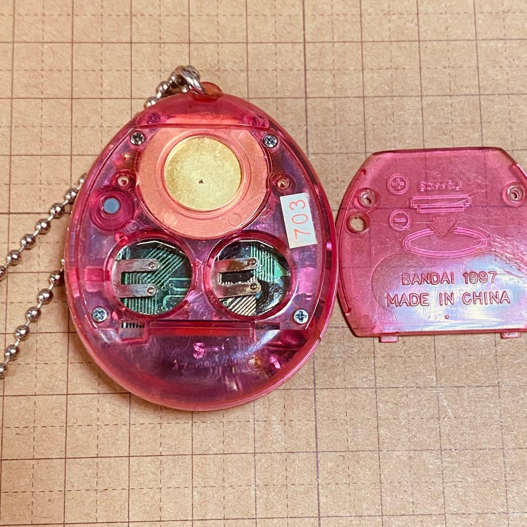 動作確認済み】 初代 たまごっち 時計柄 スケルトンピンク - メルカリ