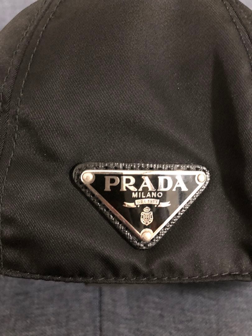 PRADA RE-NYLON ベースボールキャップ NFCタグプレートサイズL - メルカリ